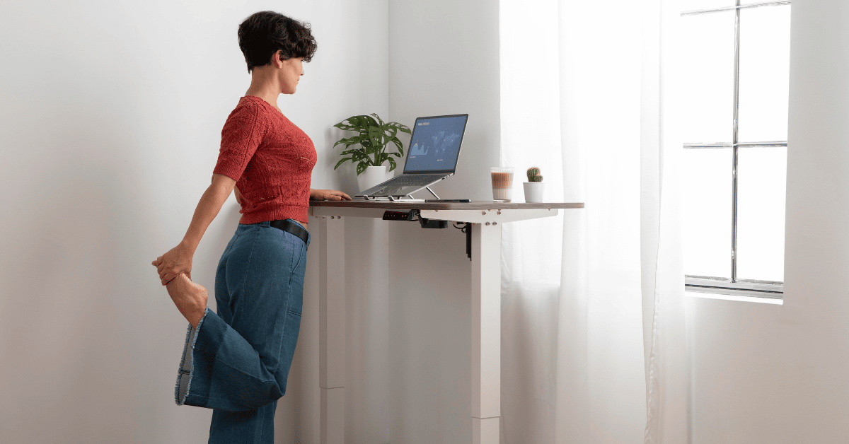 Woman-working-and-doing-exercising-to-remove-pain-from-sedentary-job