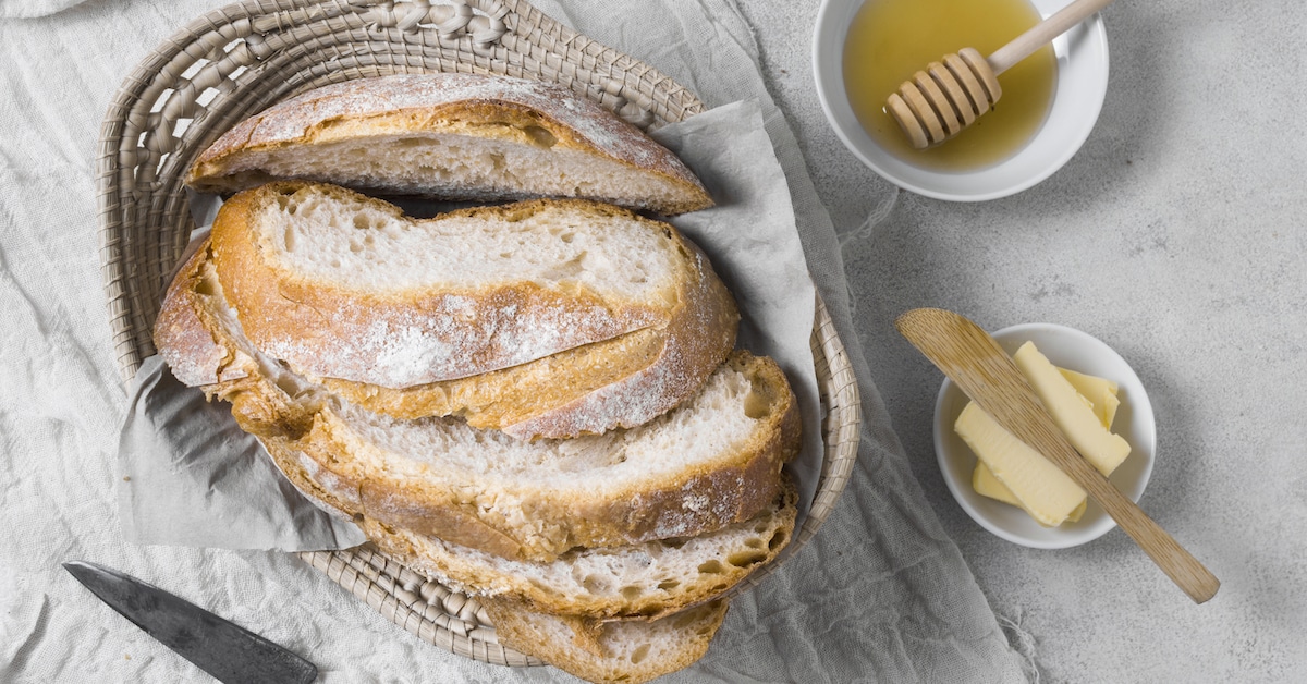 loaves-bread-basket-with-butter-honey