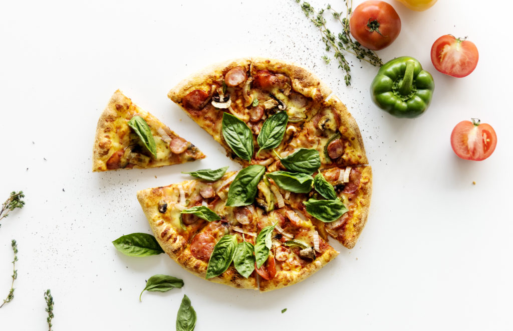 delicious-pizza-isolated-white-1024x660