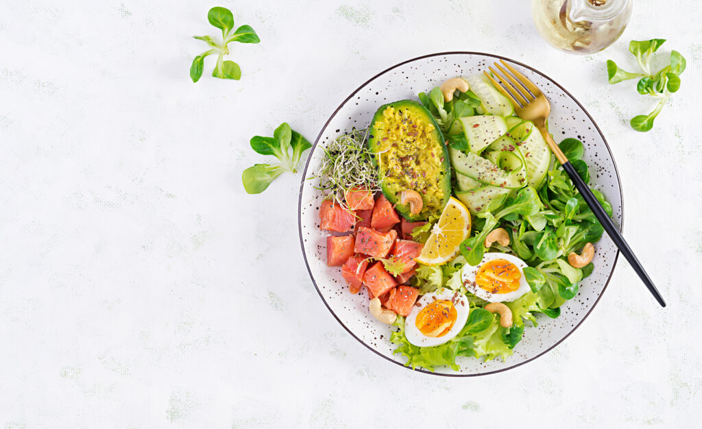 ketogenic-diet-breakfast-salt-salmon-salad-with-greens-cucumbers-eggs-avocado-keto-paleo-lunch-top-view-overhead-1024x626